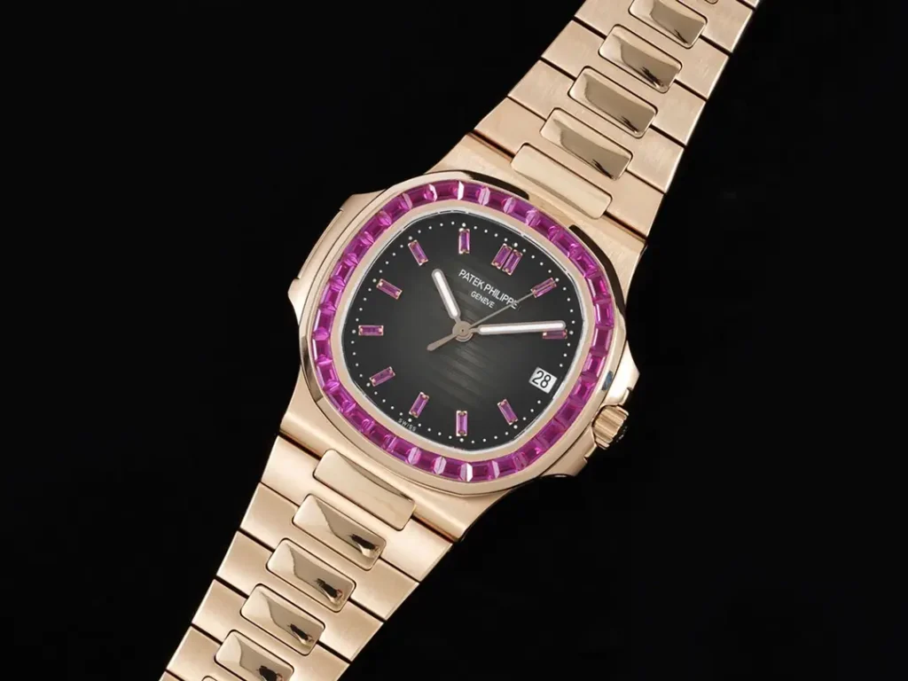Patek Philippe Nautilus black dial pink sapphire bezel rose gold case and bracelet watch