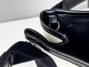 Chanel Deauville 36 A67007 black canvas and calfskin leather tote bag interior close-up
