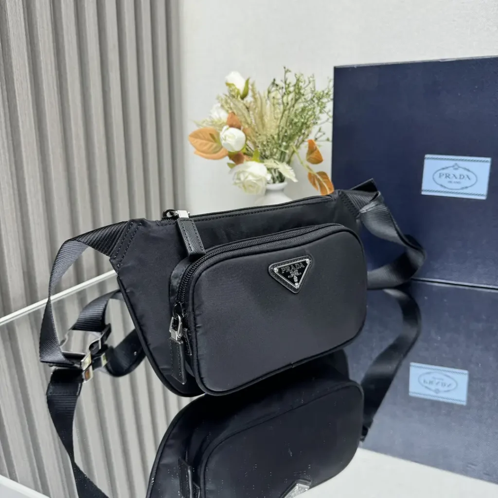 Prada Re-Edition 2005 nylon belt bag black fabric adjustable strap silver hardware