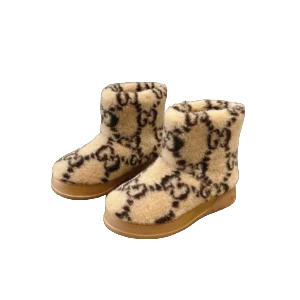 Snow bootsThis boot features wool GG jacquard surface
