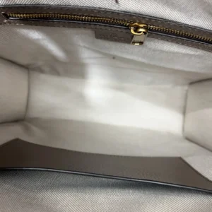 Gucci handbag interior beige fabric lining brown leather trim with gold-tone zipper detail