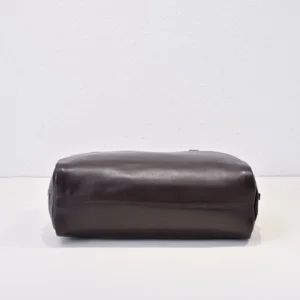Coach Duffle Bag 45 dark brown smooth leather minimalist design supple texture