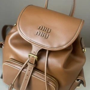 Miu Miu backpack medium tan brown leather drawstring closure buckle and front zip pocket bag