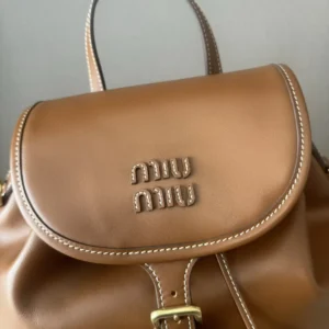 Miu Miu small leather backpack brown calf leather with front logo and buckle closure