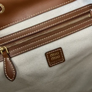 Miu Miu tote bag medium beige canvas brown leather trim gold zipper pull made in Italy