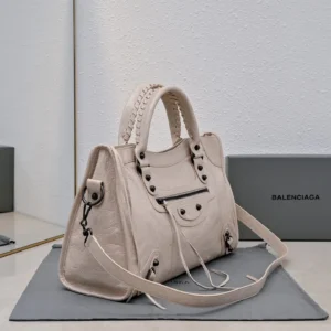 Balenciaga Classic City Bag Medium Cream color textured leather with black hardware and detachable shoulder strap