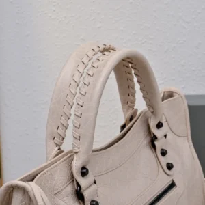 Balenciaga Classic City bag medium 115748 ivory cracked leather with braided handles and black studs