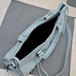 Balenciaga Classic City Small 16 bag light blue lambskin leather with braided handles and zipper closure