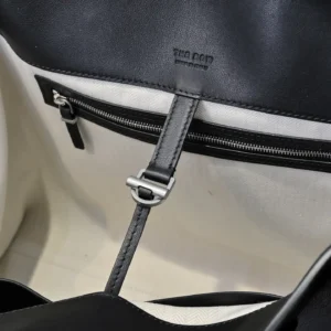 The Row leather tote bag black leather silver-tone hardware interior zipper pocket canvas lining