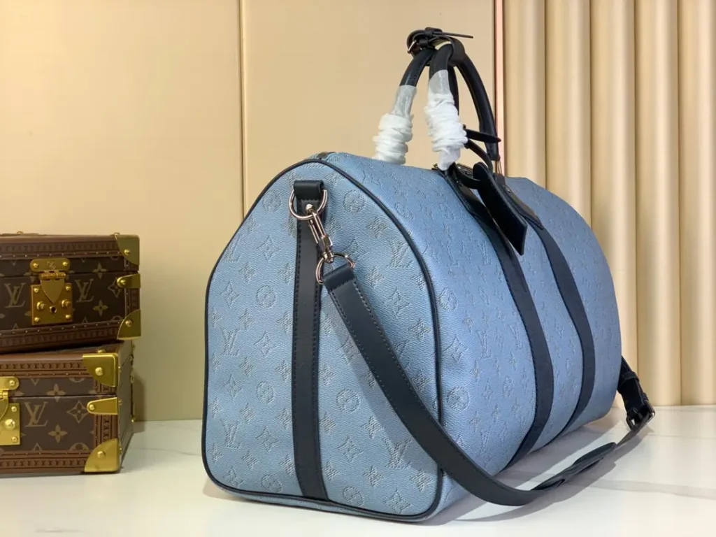 Louis Vuitton Keepall 50 M45719 blue monogram canvas duffle bag black leather trim