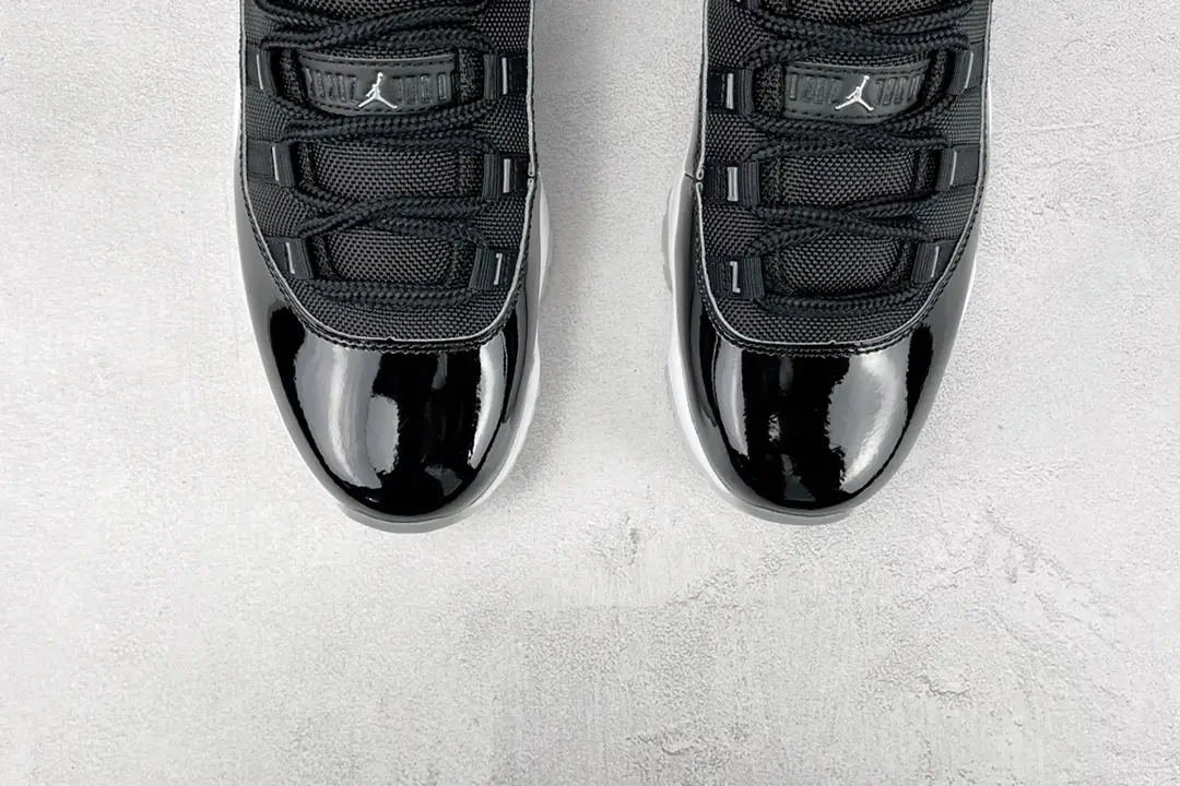 Nike Air Jordan 11 Retro black white patent leather mesh sneakers with translucent sole