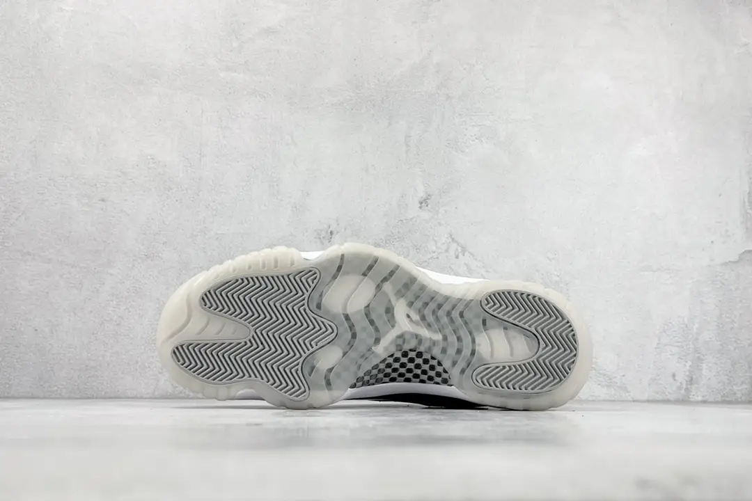 Nike Air Jordan 11 Retro Concord white black patent leather sneakers with translucent outsole