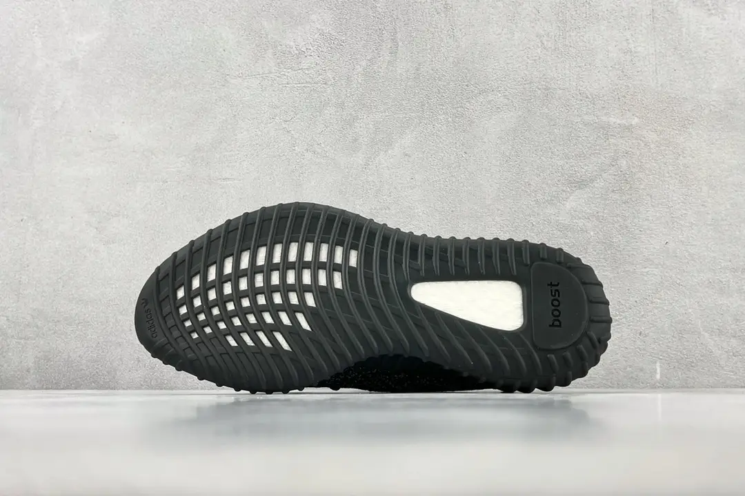 Adidas Yeezy Boost 350 V2 black primeknit sneakers with rubber outsole and Boost cushioning