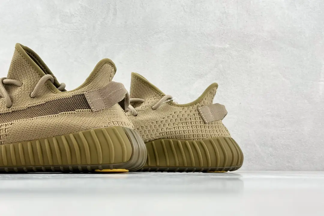 Adidas Yeezy Boost 350 V2 earth brown Primeknit sneakers with textured sole and heel tab