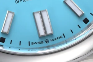 Rolex Oyster Perpetual 41 turquoise dial stainless steel case watch close-up with luminescent markers