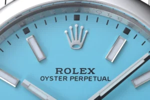 Rolex Oyster Perpetual blue dial stainless steel watch with luminous markers and hands