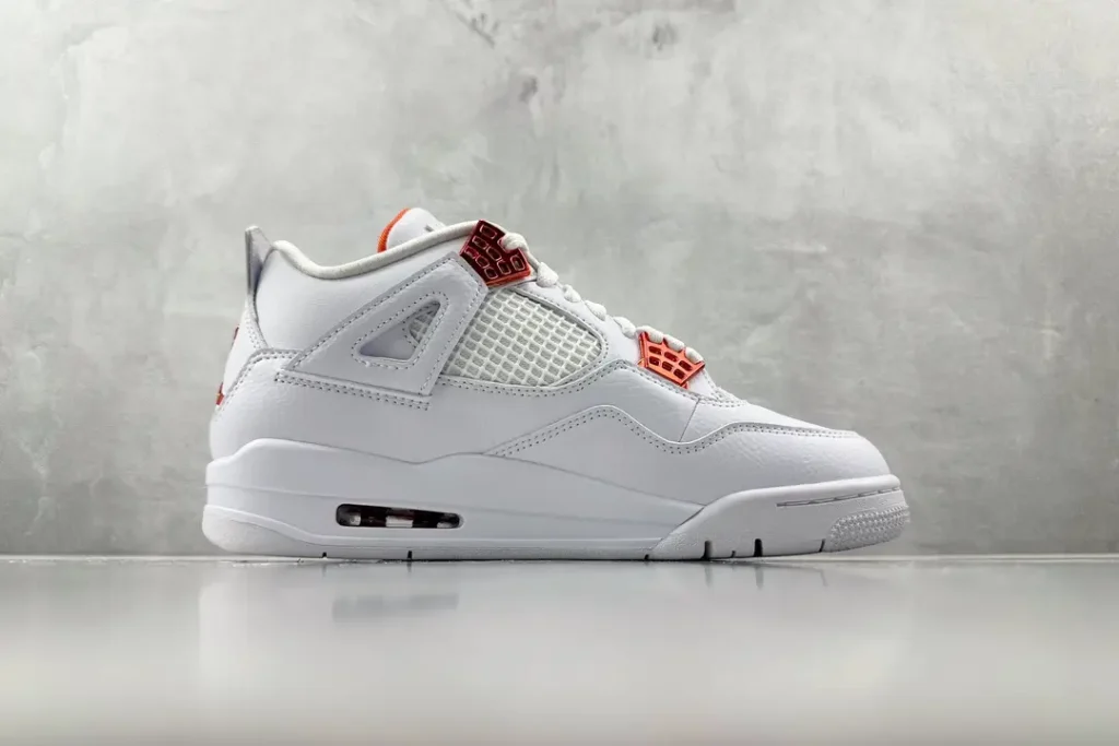 Nike Jordan 4 Retro 308497-162 white infrared leather sneaker with mesh panels and visible air sole unit