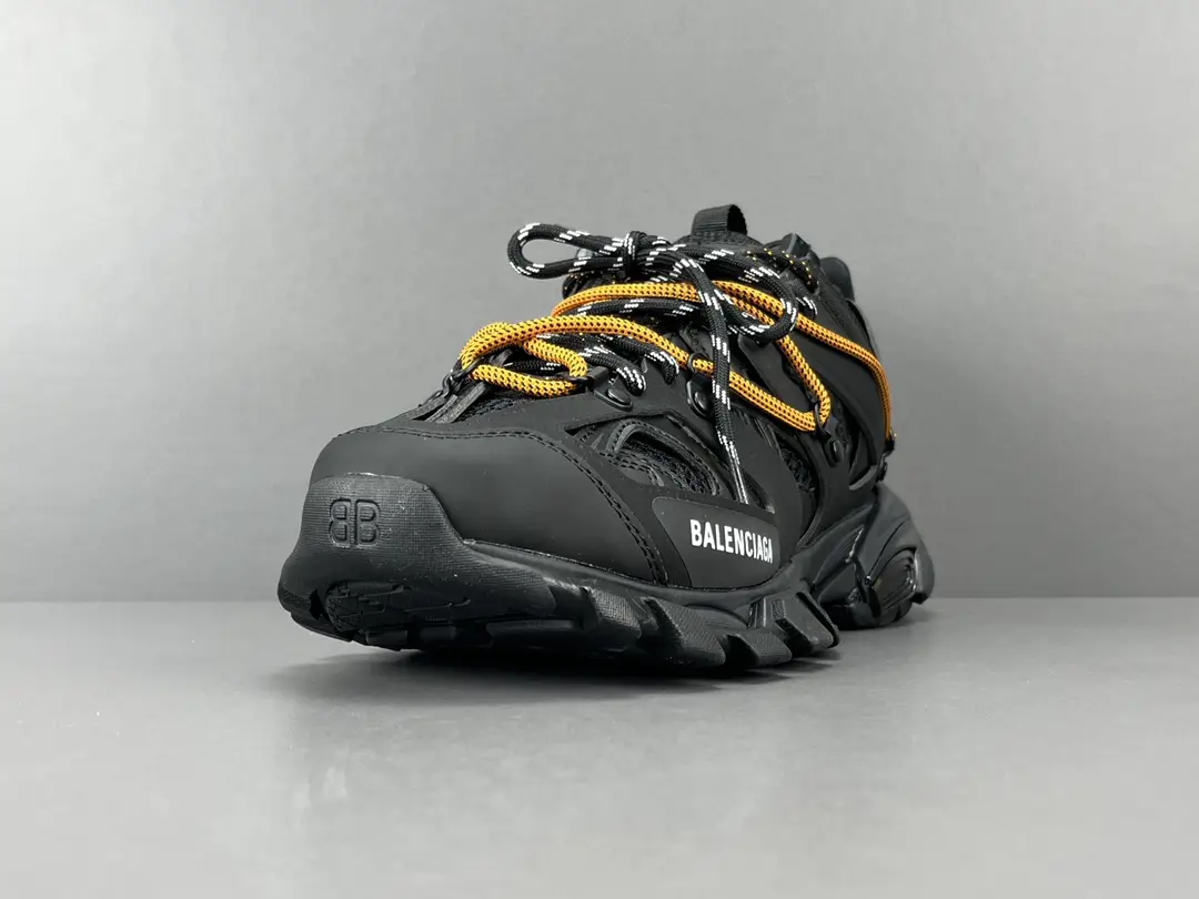 Balenciaga Track 2 black yellow reflective mixed material sneakers with layered sole and lace-up design