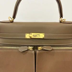 Hermès Kelly Ado 32 small taupe leather and canvas backpack gold-tone hardware