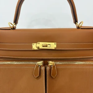 Hermès Lindy 34 bag gold brown leather canvas with gold hardware and top handle