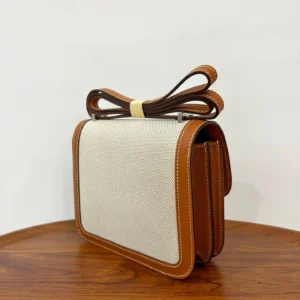 Hermès Constance 24 bag beige canvas tan leather medium size with adjustable strap
