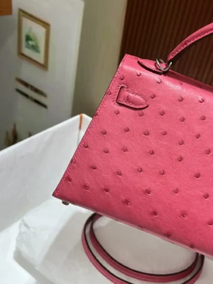 Hermès Kelly 25 bag pink ostrich leather small top handle handbag silver hardware