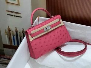 Hermès Kelly 25 handbag pink ostrich leather silver hardware small size