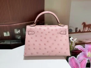 Hermes Kelly bag 25 pink ostrich leather top handle bag with gold hardware