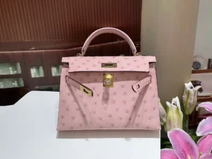 Hermès Kelly 28 pink ostrich leather handbag gold hardware