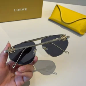 Loewe sunglasses silver metal frame black lenses decorative detail luxury eyewear with yellow leather case