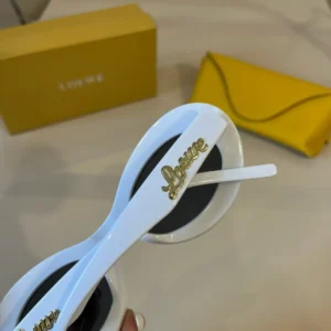 Loewe sunglasses white acetate frame gold logo detail with black lenses