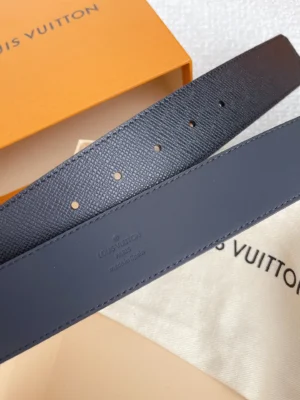 Louis Vuitton belt black textured leather reversible smooth leather accessory with holes and stitching detail