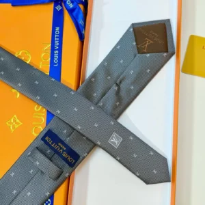 Louis Vuitton necktie gray patterned silk tie with LV monogram and branded label
