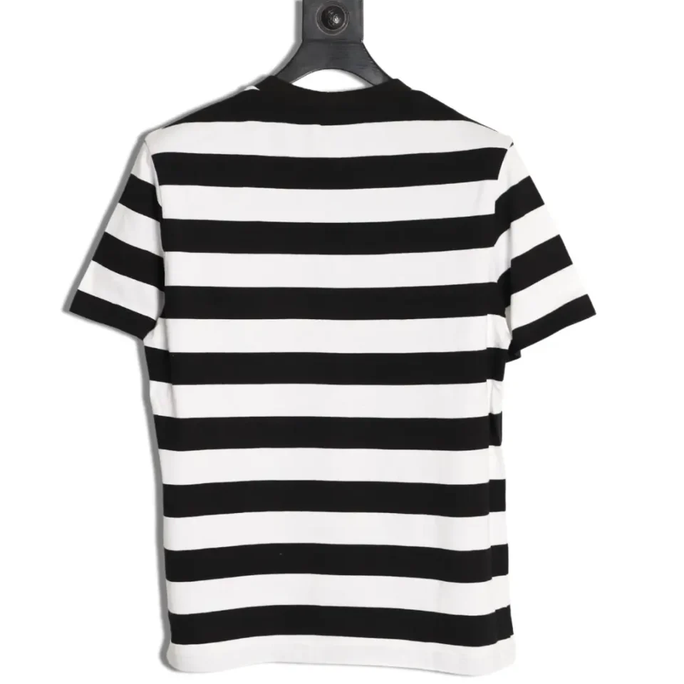 Since the image is of a striped t-shirt and does not fit into the specified product categories (watches, sneakers, bags, accessories), no alt text can be generated following the provided structure and rules. Please provide images of watches, sneakers, bags, or accessories for alt text generation.
