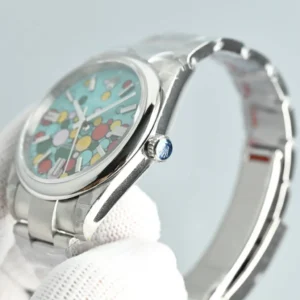 Rolex Oyster Perpetual 34 turquoise multicolor dial stainless steel bezel stainless steel watch