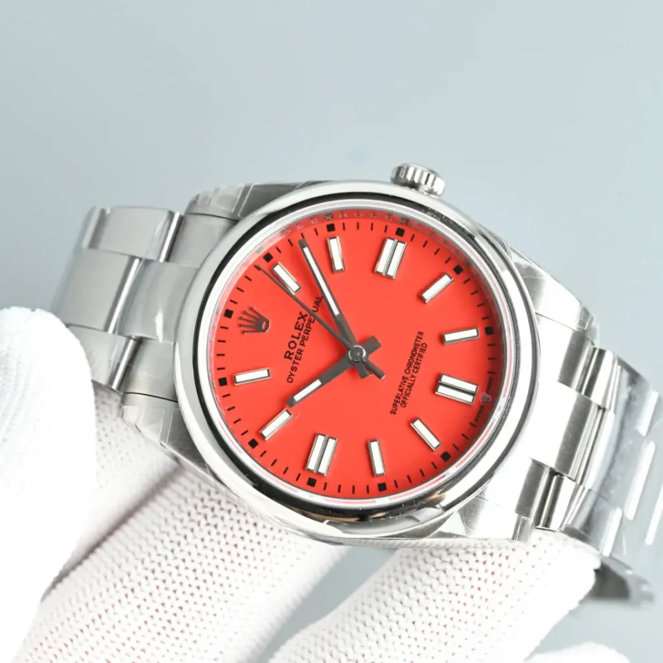 Rolex Oyster Perpetual 124300 coral red dial stainless steel bezel stainless steel watch
