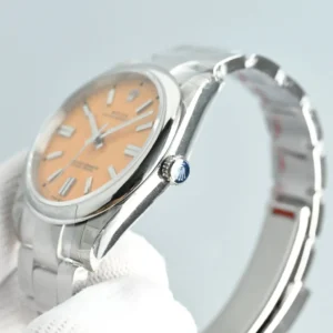 Rolex Oyster Perpetual 124300 salmon dial smooth bezel stainless steel watch