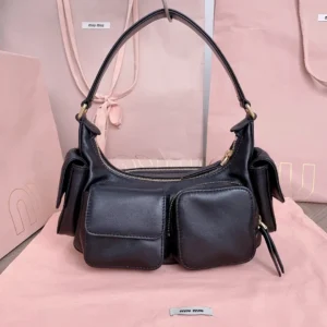 Miu Miu small leather shoulder bag black lambskin leather with front pockets and gold-tone hardware