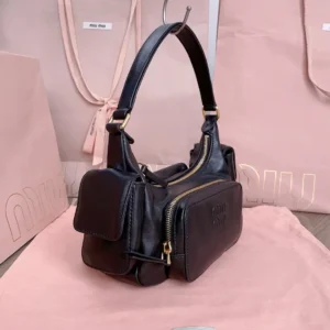 Miu Miu small shoulder bag black leather gold-tone zippers and hardware multiple compartments