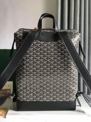 Goyard backpack medium size black leather trim coated canvas with signature chevron pattern and top handles