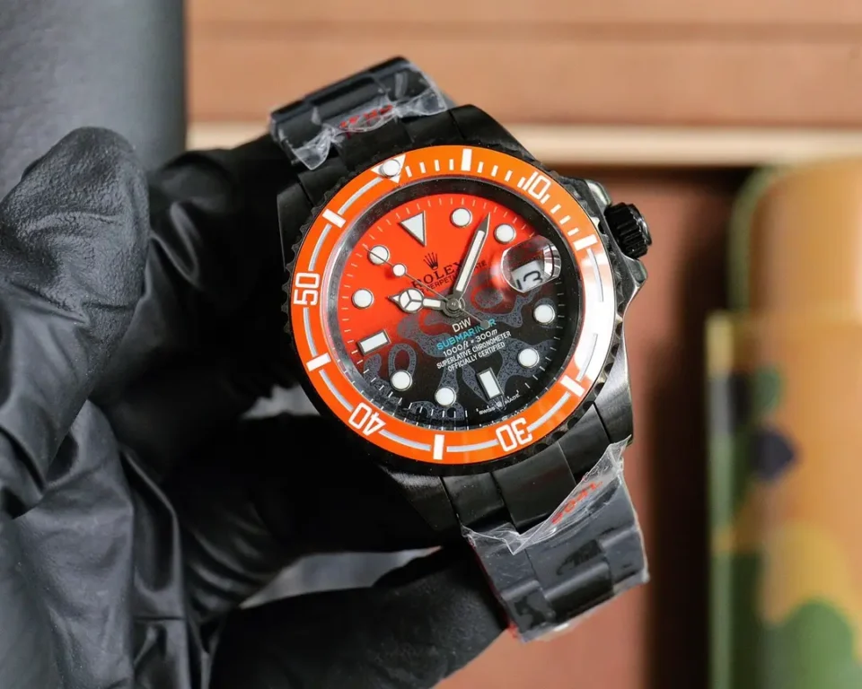 Rolex Submariner black and orange dial orange bezel black stainless steel watch