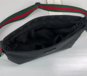 Gucci messenger bag medium black GG canvas adjustable green red striped strap