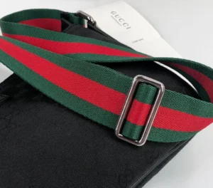 Gucci messenger bag black canvas green red striped adjustable fabric strap silver buckle