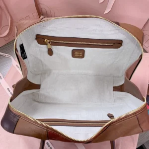 Miu Miu tote bag medium brown patchwork leather and canvas interior with zip pocket and gold hardware