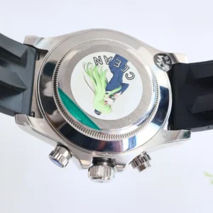 Rolex Daytona stainless steel watch case back with black rubber strap and engraved crown emblem