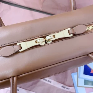 Miu Miu tote bag medium beige leather gold zipper hardware luxury handbag
