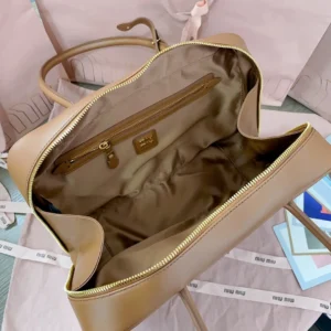 Miu Miu leather tote bag beige medium smooth leather with gold zip interior pocket lining