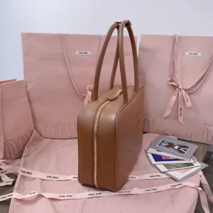 Miu Miu leather bag medium tan brown smooth leather with gold zipper and double handles
