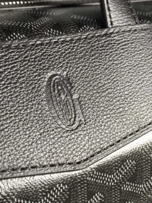 Louis Vuitton Keepall 55 black leather monogram canvas duffle bag with embossed logo detail