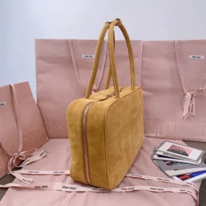 Miu Miu handbag medium size tan suede leather with dual top handles and zipper closure